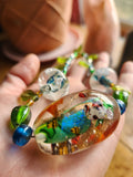 Hand blown glass necklace with amazing butterfly and bee bead