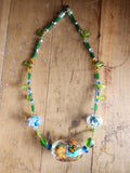Hand blown glass necklace with amazing butterfly and bee bead