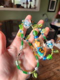Hand blown glass necklace with amazing butterfly and bee bead